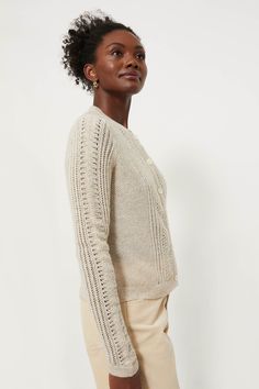 An incredibly cozy throw-on-and-go pieceKnitted from a wool blend with a touch of mohair for added softness and texture, the Champagne Addison Cardigan is delicate and warm all at once with it's open lace stitch detail. Wear this as a sweater with your fav jeans or layered over a blouse or a dress. Our Favorite Details: Open lace stitch detail Ribbed finishes Slightly cropped silhouette Material: 40% Wool, 20% Cotton, 19% Polyamide, 15% Acrylic and 6% MohairCare: Dry clean About the BrandWe love Daywear Cardigan In Pointelle Knit, Daywear Pointelle Knit Sweater, Pointelle Knit Sweater For Daywear, Daywear Sweater In Pointelle Knit, Pointelle Knit Cardigan For Layering, Spring Wool Sweater With Pointelle Knit, Wool Pointelle Knit Sweater For Spring, Elegant Knitted Cardigan For Layering, Elegant Pointelle Knit Cardigan For Daywear