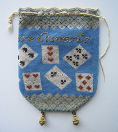 a blue bag with playing cards on it