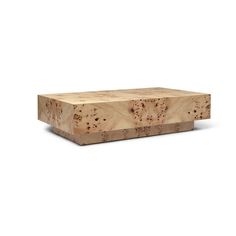 a large wooden box sitting on top of a white surface with no one around it