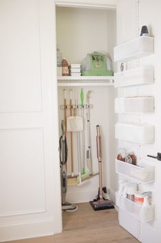 the closet is clean and ready to be used as a storage area for cleaning supplies