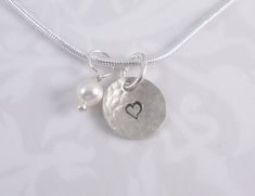 "This necklace has a heart hand stamped on a hammered sterling silver 3/8\" charm.  A white pearl hangs with it. Thanks for looking :)" Heart Hands, Silver Snake Chain, Hammered Sterling Silver, White Pearl, Snake Chain, Sterling Silver Charm, A Heart, Silver Charms, Pearl White