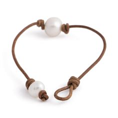 Brown Elegant Everyday Jewelry, Everyday Elegant Brown Jewelry, Elegant Brown Everyday Jewelry, Elegant Brown Jewelry With Leather Strap, Elegant Brown Leather Jewelry, Elegant Bracelet With Leather Strap, Modern Adjustable Pearl Bracelet For Formal Occasions, Timeless Adjustable Leather Strap Bracelets, Classic Adjustable Single Strand Bracelet