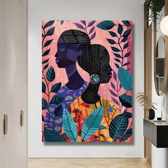 a woman's face is shown in front of an abstract painting on the wall