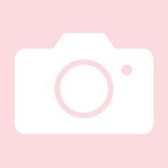 an image of a camera on a pink background