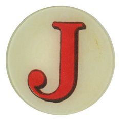 the letter j is painted in red and white