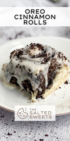 an oreo cinnamon roll on a white plate with the title overlaying it