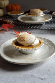 an eggless pumpkin pie on a plate with the words, eggless pumpkin pie vg