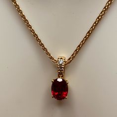 10 Kyg 7 X 5 Mm Oval Lab Created Ruby With 3 Diamonds On Mounting 1 Mm, Color F, Clarity Si1. There Are Three Diamonds On Bail Varying Sizes, Color F, Clarity Si1. 10 Kyg 1 Mm Wheat 18” Chain Red Jewelry Necklace, Gold Necklace Design, Body Jewelry Diy, Diamond Gold Necklace, Stylish Jewelry Accessories, Beautiful Pendants, Princess Jewelry, Earrings Design, Ruby Pendant