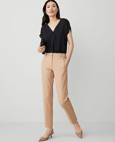 Elevate your wardrobe with the sophisticated charm of Ann Taylor's The Eva Ankle Pant. Perfectly tailored to flatter, these pants feature a slim leg that gracefully crops at the ankle, enhancing your silhouette with its sleek proportions. 

- Size: 10
- Color: Cappuccino Tan
- Material: 92% Cotton, 8% Spandex
- Gender: Female
- Fit: Tailored and fitted
- Rise: Mid-rise, sits 2 1/4" below natural waist
- Length: Hits at ankle, 27" inseam with a 14 1/2" leg opening
- Closure: Front zip with hook-a Lean Legs, Knitted Suit, Tan Woman, Petite Pants, Womens Dress Pants, Slim Leg, Ankle Pants, Waist Length, Slim Legs