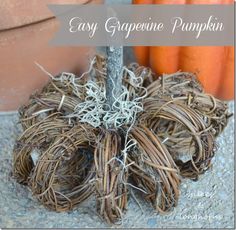 a pumpkin sitting on top of a pile of hay