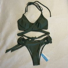 Cupshe Dark Green Crossover Bikini Set With Knot Design Top Comes With Removable Padding Bottoms Provide Minimal Coverage New With Tags - Never Worn Size Small Green Swimwear With Crisscross Straps For Beach, Green Beach Swimwear With Crisscross Straps, Beachwear Swimwear With Crisscross Tie-side Bottom, Sunbathing Swimwear With Crisscross Straps And Tie-side Bottom, Swimwear With Crisscross Straps And Tie-side Bottom For Sunbathing, Crisscross Straps Swimwear With Tie-side Bottom For Sunbathing, Green Strap Swimwear For The Beach, Green Strapped Swimwear For Beach, Green Strapped Summer Swimwear