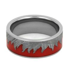 Light a flame when you give this unique, red fire ring as a gift to that special guy in your life. Side by side, red enamel and my signature Gibeon Meteorite meet in a waving flame design. This handcrafted masterpiece lays in a durable titanium band. RING LAYOUTRing Width: 8 mmRing Sleeve: TitaniumRing Profile: FlatRing Finish: Polished 0.5 mm Titanium7 mm Red Flame Enamel and Gibeon Meteorite*0.5 mm Titanium Gibeon Meteorite, Mens Wedding Bands Unique, Meteorite Jewelry, Unique Mens Rings, Fire Ring, Flame Design, Unique Wedding Bands, Titanium Rings, Ring Fit