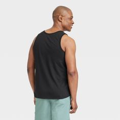 Bring cool comfort to warm-weather days with this Standard-Fit Tank Top from Goodfellow & Co™. Crafted from a lightweight jersey fabric, this standard-fit tank top offers you all-day cool comfort. Falling at the hip for wearing tucked in or untucked, you can coordinate this solid round-neck tee with different bottoms, or layer it under a button-down or hoodie for versatile styling. Goodfellow & Co™: Where style & fit are always in good company. Cool Kicks, In Good Company, Weather Day, Round Neck Tees, Men's Tank, Workout Tank Tops, Fabric Names, Good Company, Jersey Fabric