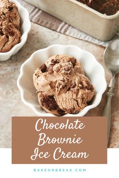 chocolate brownie ice cream in a white bowl with spoons next to it on a table