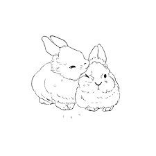 two rabbits sitting next to each other on top of a white sheet with black ink