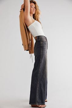 *The* perfect pair of jeans from The CRVY Collection, featured in a high-rise, wide-leg silhouette and curve-hugging waist design for the perfect fit with every wear. * High-rise silhouette * Zip fly and button closure * Five-pocket design * Rigid denim fabrication | CRVY Gia Wide-Leg Jeans by We The Free at Free People in Dark Wash, Size: 34 Jeans Free People, High Rise Wide Leg Jeans, All Jeans, Concert Fits, Embellished Jeans, Blue Fits, Baggy Jeans, Boho Clothing, Pocket Design