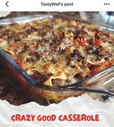 a casserole dish with meat and cheese on it