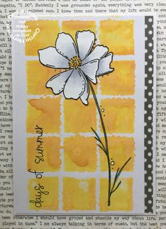 a card with a white flower on it