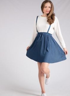 This adorable overall skirt is the perfect comfy, casual piece! It has a cinched waist with a tied string in the front, and an A-line cut skirt. Model is wearing a small. 100% rayon *Free shipping & returns on orders over $50! Casual Mini Suspender Dress For Spring, Casual Mini Length Suspender Dress For Spring, Casual Spring Suspender Dress With Tie Straps, Casual A-line Skirt For Daywear, Casual Spring Suspender Dress For Day Out, Casual Mini Suspender Dress For Day Out, Cotton Suspender Dress With Tie Straps For Day Out, Spring Dresses With Drawstring Tie For Daywear, Casual Spring Sundress With Flowy Skirt