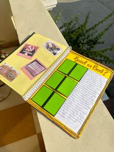 an open notebook sitting on top of a table