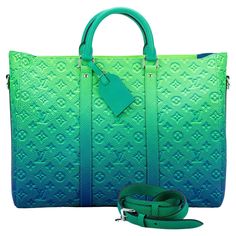 Virgil Abloh takes the House’s classic weekend bag into a maximalist world of color and energy. The bright florescent colors of the Taurillon Illusion leather give an entirely new feel to the embossed Monogram pattern that adorns this bag. New with original dust cover and box. Designer Green Bag With Handle Drop, Green Luxury Bag For Errands, Luxury Green Bags For Errands, Luxury Green Satchel For Daily Use, Luxury Green Tote Satchel, Luxury Green Satchel For Errands, Luxury Green Shoulder Bag For Travel, Luxury Green Bags, Luxury Green Satchel With Removable Pouch