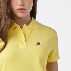 This polos are designed for the modern woman who values both style and comfort.Crafted from 100% Pima cotton, are perfect for a day at the office or a relaxing weekend getaway, ensuring you always look effortlessly chic. Crafted in Peru100% Pima CottonGold Embroidered James Bark LogoRibbed Finishes Classic Yellow Polo Shirt For Spring, Summer Collared Polo Shirt, Casual Yellow Cotton Polo Shirt, Trendy Summer Cotton Polo Shirt, Summer Cotton Polo Shirt With Relaxed Fit, Summer Cotton Relaxed Fit Polo Shirt, Basic Cotton Polo Shirt For Summer, Relaxed Fit Cotton Polo Shirt For Summer, Basic Summer Cotton Polo Shirt