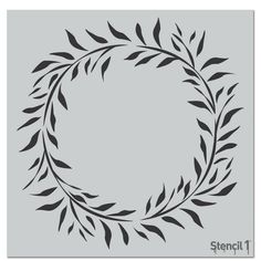 the stencil circle is shown with leaves and branches in black on a gray background