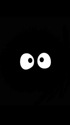 a black background with two eyes and one eye is shown in the center of the image