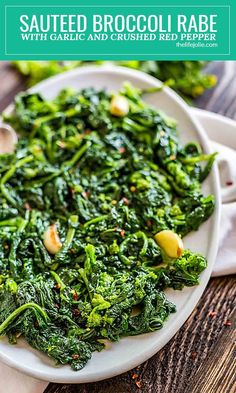 sauteed broccoli rabe with garlic and crushed red pepper on a white plate