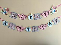 a happy birthday banner hanging on the wall