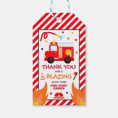 a red and white thank card with a firetruck on the front that says, thank you for a blazing good time