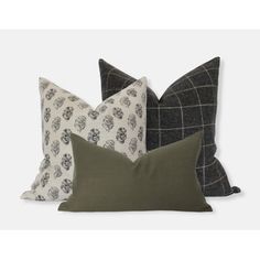 four pillows with different patterns and colors