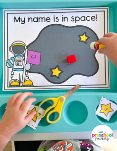 My name is in space! Work on learning name recognition with this space themed name craft. Easily edit each name using PowerPoint or use the pre-made star letters included in the PDF! Students can cut and paste each alphabet star to the space craft page to spell their name. (BW and color options have been provided for this craft) Space Preschool Theme Activities, Space Words Preschool, Space Abc Preschool, Outer Space Prek, Space Themed Letter Activities, Space Themed Writing Activities, Dramatic Play Centers Preschool, Pre-k Writing