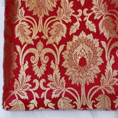 Rose Red Brocade by the Yard Indian Fabric Gold Banarasi Dress material for Wedding Dresses Costumes lehnga Blended Sewing Crafting Curtains ➤Product: Brocade Fabric ➤Fabric Type: Blended Silk (Viscose and Silk) Fine quality Zari Brocade Weaving from Banarasi ➤Color: Rose Red and Gold ➤Width: 44 inches. ➤Condition: New  ➤Code: bg2407 ➤Listing for 1 Yard of fabric. ➤Care: Dry Clean Only You can use this fabric to make Dresses, Tops, Blouses, Jackets, Crafting, Clutches or Evening Bags, Embellish your clothes, Pillows, Drapery, Home Décor, Outdoor, Quilting, Sewing, General, Upholstery etc use it for scrap booking projects. If you purchase more than 1 Yard you will get it in running length, not in pieces. Please note: Any customs charges or local taxes in customers country are the responsibi Indian Fabric, Brocade Fabric, Costume Dress, Red And Gold, Dress Materials, Red Roses, Selling On Etsy, Weaving, Sewing