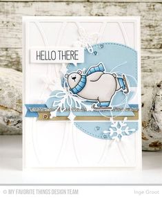 a handmade card with an elephant on it and snowflakes in the background