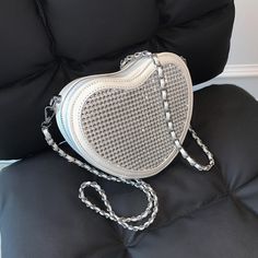 Be classy but sassy, with rhinestone detail in a heart shape design bag and a classic vintage style chain. Size: 18 x 14 x 5cm Heart-shaped Evening Bag With Chain Strap, Heart-shaped Evening Bags With Chain Strap, Trendy Heart-shaped Evening Bags, Elegant Heart-shaped Bags, Chic Heart-shaped Shoulder Bag For Party, Chic Rhinestone Shoulder Bag As Gift, Heart-shaped Shoulder Bag With Chain Strap For Party, Heart-shaped Party Shoulder Bag With Chain Strap, Heart Shape Design