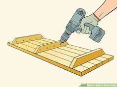 a person using a power drill to cut wood planks with a jik tool