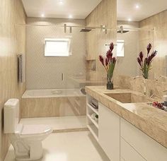 a bathroom with two sinks, a toilet and a bathtub