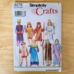 an image of children's sewing pattern for crafts on a wooden table with the title simplily crafts