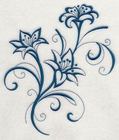 a white towel with blue flowers and swirls drawn on it's back side