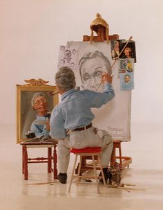 an older man is sitting in front of his easel and painting on the easel