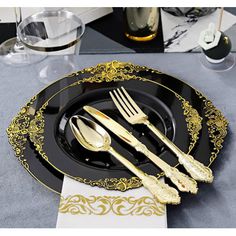 black and gold place setting with silverware