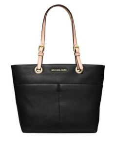 This is a classic and luxurious leather tote bag by MICHAEL Michael Kors! Crafted from soft leather, it flaunts gleaming signature hardware and a refined and ready-for-anything shape. Made of Leather. Double handles with 8-1/2" drop. Top zip closure. Exterior features metal hardware and 4 pockets. Interior features 1 zip pocket, 3 open pockets, 1 cell phone pocket and 1 key fob. 16" W x 11" H x 5" D. Color: Black Outlet Michael Kors, Cheap Michael Kors Bags, Michael Kors Tote Bag, Michael Kors Bedford, Pocket Handbag, Cheap Michael Kors, Michael Kors Outlet, Zip Tote, Purses Michael Kors