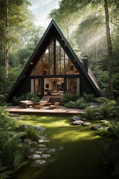 a - frame cabin in the woods with grass and rocks