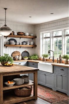 a kitchen with gray cabinets and wooden shelves