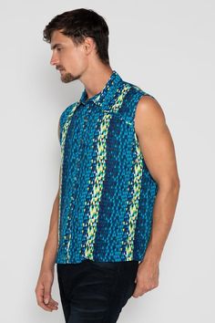 Geometric Shirt Men, Psychedelic Shirt, Festival Clothing Welcome to Paradise! This lightweight sleeveless shirt is perfect for all your spring / summer festive occasions! Its psychedelic blue colours will capture you in the moment. Summer Cotton Tops With Geometric Pattern, Casual Summer Tops With Geometric Pattern, Summer Shirt With Geometric Pattern, Blue Abstract Print Tops For Summer, Summer Beach Tops With Geometric Pattern, Summer Geometric Pattern Shirt, Green Geometric Pattern Tops For Summer, Summer Geometric Patterned Shirt, Geometric Pattern Summer Beach Top