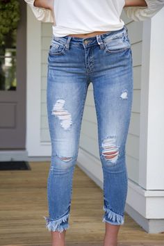 Saying we love this jean, just isn’t strong enough. All of the best things you love in stylish jeans, all rolled into one perfect look. This mid-rise, medium wash beauty hits right above the ankle and features a double frayed hem. So unique and perfect! These do fit a little snugger than the Mackenzie or the Samantha Jean. If you are in-between sizes we say size up. 8.5” Rise 27” Inseam Brand: Kancan Medium Wash Ankle Skinny Distressed Frayed Double Hem Moderate Stretchiness 98% Cotton, 2% Spand Stretch Cropped Jeans With Frayed Hem In Dark Wash, Everyday Ripped Medium Wash Cropped Jeans, Everyday Medium Wash Cropped Jeans With Frayed Hem, Everyday Dark Wash Jeans With Frayed Hem, Dark Wash Stretch Cropped Jeans With Frayed Hem, Stretch Cropped Jeans With Frayed Hem In Medium Wash, Mid-rise Distressed Dark Wash Cropped Jeans, Distressed Mid-rise Cropped Jeans For Everyday, Stretch Jeans With Frayed Hem In Dark Wash