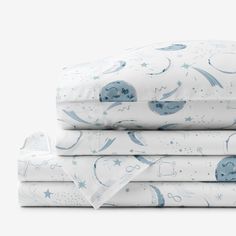 three sheets are stacked on top of each other with blue and white space themed designs