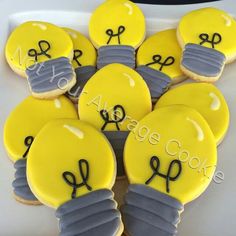 decorated cookies in the shape of light bulbs