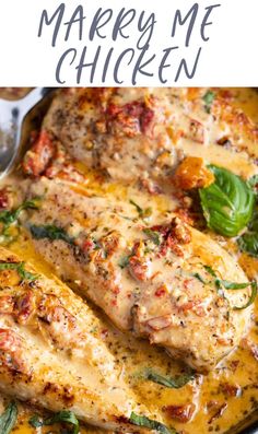 a close up of chicken in a pan with sauce and herbs on the side that says marry me chicken